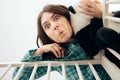 Mother Holding a Panda Bear Toy Calming Baby in the Crib