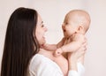 Mother holding smiling baby boy Royalty Free Stock Photo