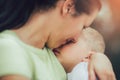 Mother holding to her asleep little son Royalty Free Stock Photo