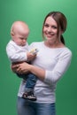 Mother holding toddler son with toy phone Royalty Free Stock Photo