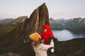 Mother holding up baby family vacation travel in mountains Norway Royalty Free Stock Photo