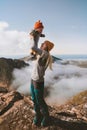 Mother holding up child hike in mountains family vacation healthy  lifestyle outdoor Royalty Free Stock Photo