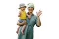 Mother holds a happy toddler baby boy in her arms and waves her hang Royalty Free Stock Photo