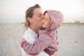 Mother holds her child outdoors. Family values Royalty Free Stock Photo