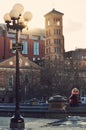 Mother hugs a girl in Washington Square Park