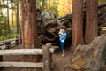 Mother with infant visit Sequoia national park in California, US