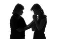 Mother on an isolated background comforted her teenage daughter who was crying