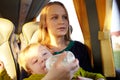Mother with kid in the bus. Royalty Free Stock Photo