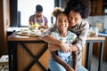 Mother and child having fun preparing healthy food in kitchen Royalty Free Stock Photo