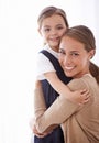 Mother, kid and hug for love and security, happy in portrait with bonding and care at family home. Safety, trust and Royalty Free Stock Photo