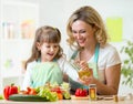 Mother and kid preparing healthy food Royalty Free Stock Photo