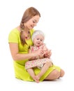 Mother and kid sitting and counting fingers together Royalty Free Stock Photo