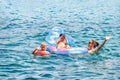 Mother and kids have fun swimming in sea in Marmaris