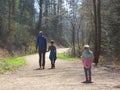 Mother with kids hiking in forest Royalty Free Stock Photo