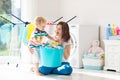 Family in laundry room with washing machine