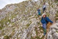 Mother and kids on mountain trek Royalty Free Stock Photo