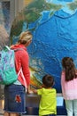 Mother and kids in a museum