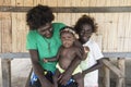 Mother with kids in Pirumeri, Solomon Islands