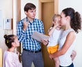 Mother with kids receiving debt collector