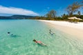 Mother and kids snorkeling Royalty Free Stock Photo