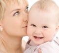 Mother kiss her baby girl Royalty Free Stock Photo