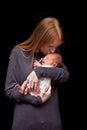 Mother kissing baby Royalty Free Stock Photo