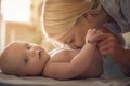 Mother kissing her baby boy. Royalty Free Stock Photo