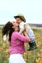 Mother Kissing Her Child Royalty Free Stock Photo