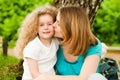 Mother kissing her daughter Royalty Free Stock Photo