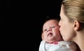 Mother kissing her new born baby Royalty Free Stock Photo