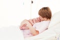 Mother kissing her newborn baby Royalty Free Stock Photo