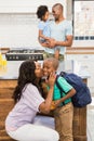 mother kissing her son going to school Royalty Free Stock Photo