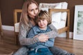 Mother is kissing his son. Mom and son. Happy mother`s day. Mother hugging her child Royalty Free Stock Photo