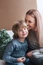 Mother is kissing his son. Mom and son. Happy mother`s day. Mother hugging her child Royalty Free Stock Photo