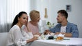 Mother-in-law and son talking and ignoring girlfriend, unhealthy relations