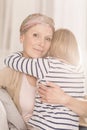 Mother with leukemia hugging child Royalty Free Stock Photo
