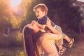 Mother lifting son Royalty Free Stock Photo