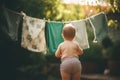 little baby hang reusable diapers , concept of Environmental Consciousness, created with Generative AI technology