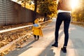 Mother little baby walking in the park and enjoying the beautiful autumn nature Royalty Free Stock Photo