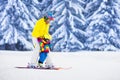 Mother and little boy learning to ski Royalty Free Stock Photo