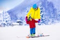 Mother and little boy learning to ski Royalty Free Stock Photo