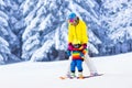 Mother and little boy learning to ski Royalty Free Stock Photo