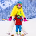 Mother and little boy learning to ski Royalty Free Stock Photo