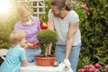 Mother and little boy shopping in gardening center Royalty Free Stock Photo