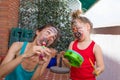 Mother and little child with painted face playing music