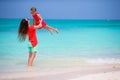 Mother and little daughter enjoying time at tropical beach Royalty Free Stock Photo