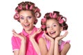 Mother and little daughter in hair curlers Royalty Free Stock Photo