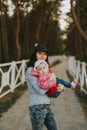 Mother and little daughter having fun on the beach. Authentic lifestyle image Royalty Free Stock Photo