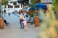 Mother and little daughter having fun on the beach. Authentic lifestyle image Royalty Free Stock Photo