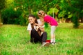 Mother and little daughter playing together in park. Outdoor Portrait of happy family. Happy Mother`s Day Joy. Royalty Free Stock Photo